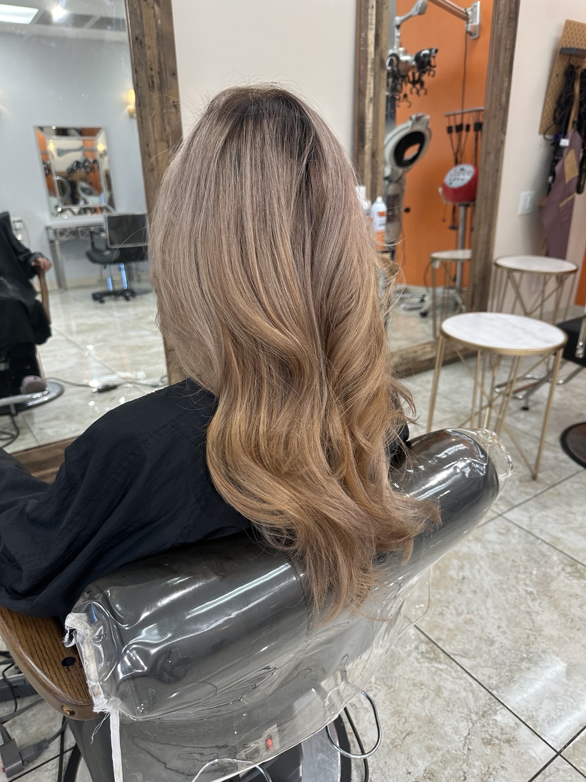 Dimensional blonde layered hair created at LEEKAJA HAIRBIS in Chandler